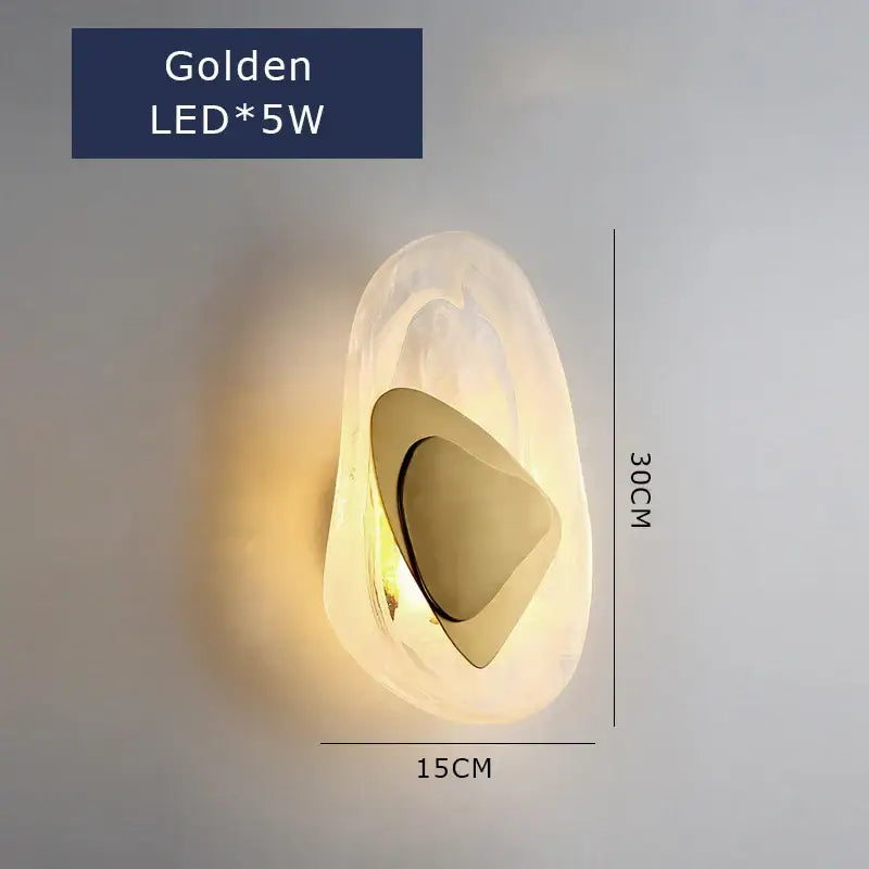 A modern wall lamp with a translucent white shell design and golden led cloud inner accent for bedroom decorbites golden led