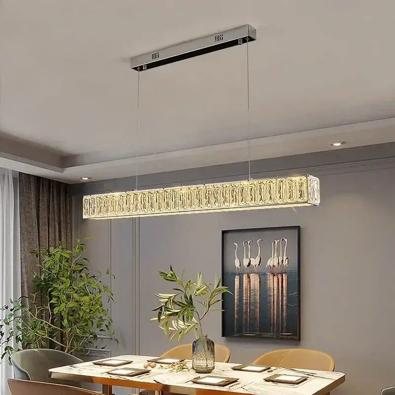 Modern golden led crystal chandelier with silver frame and faceted crystals emits warm light for dining room decorbites golden led