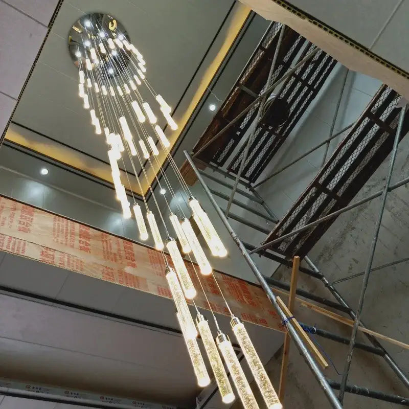 Modern golden led crystal chandelier with cascading cylindrical glass bulbs and chrome fixture for living room decorbites golden led