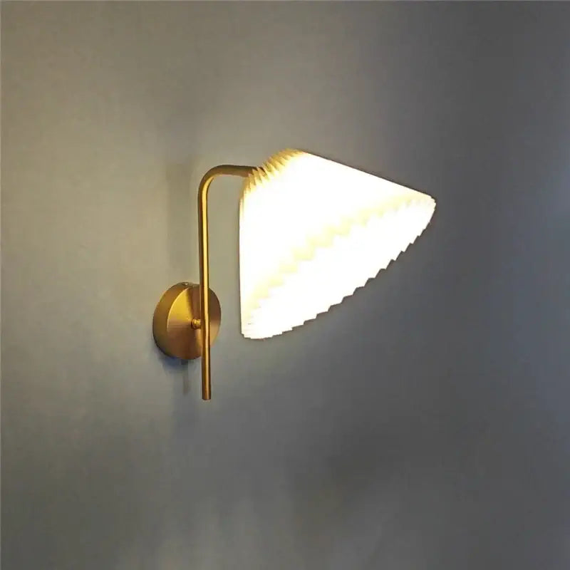 Modern golden led reading wall lamp with gold-toned finish and pleated white lampshade for minimalist bedroom decorbites golden led