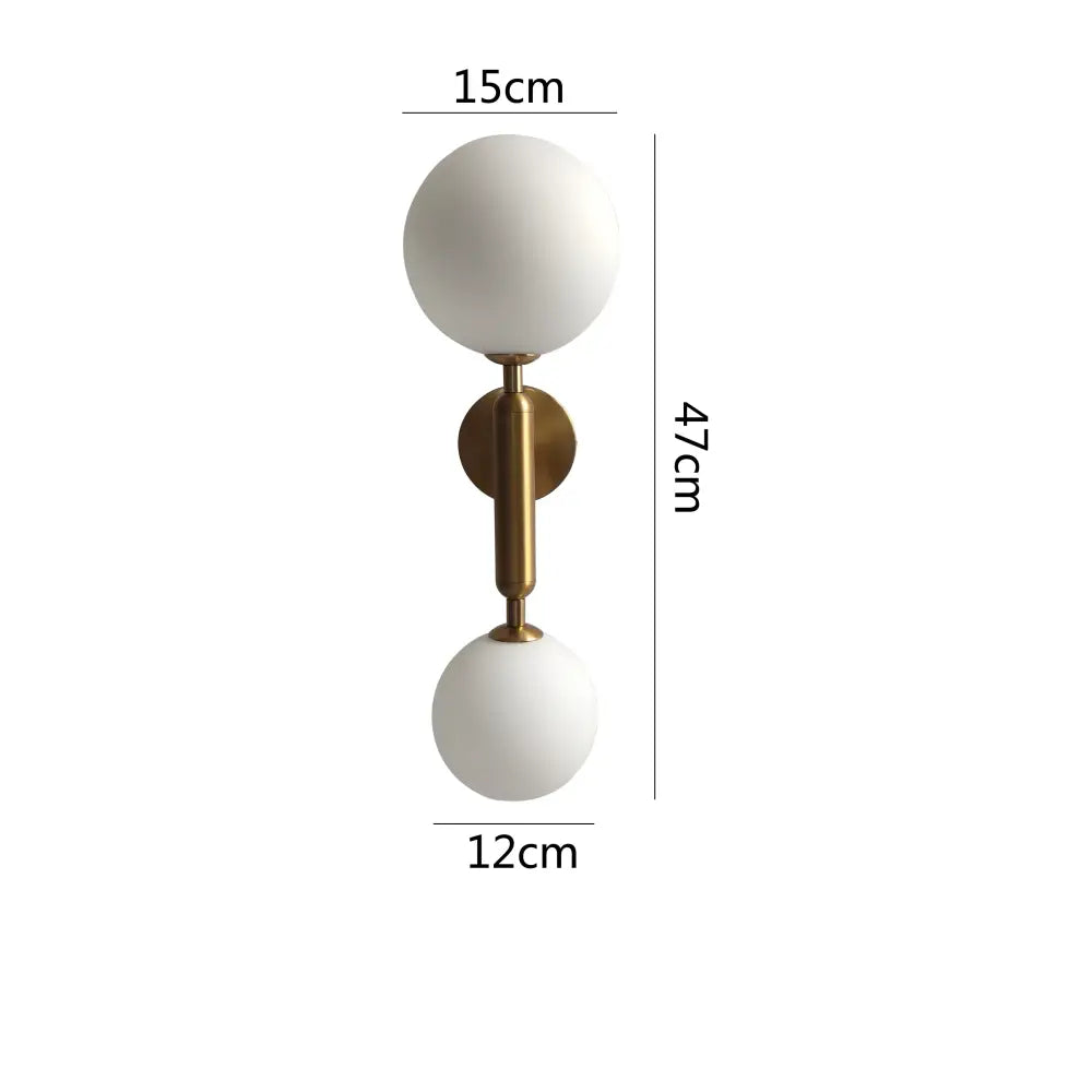 Modern golden led wall sconce featuring frosted white glass globes and brushed brass stem for bedroom decorbites golden led wall