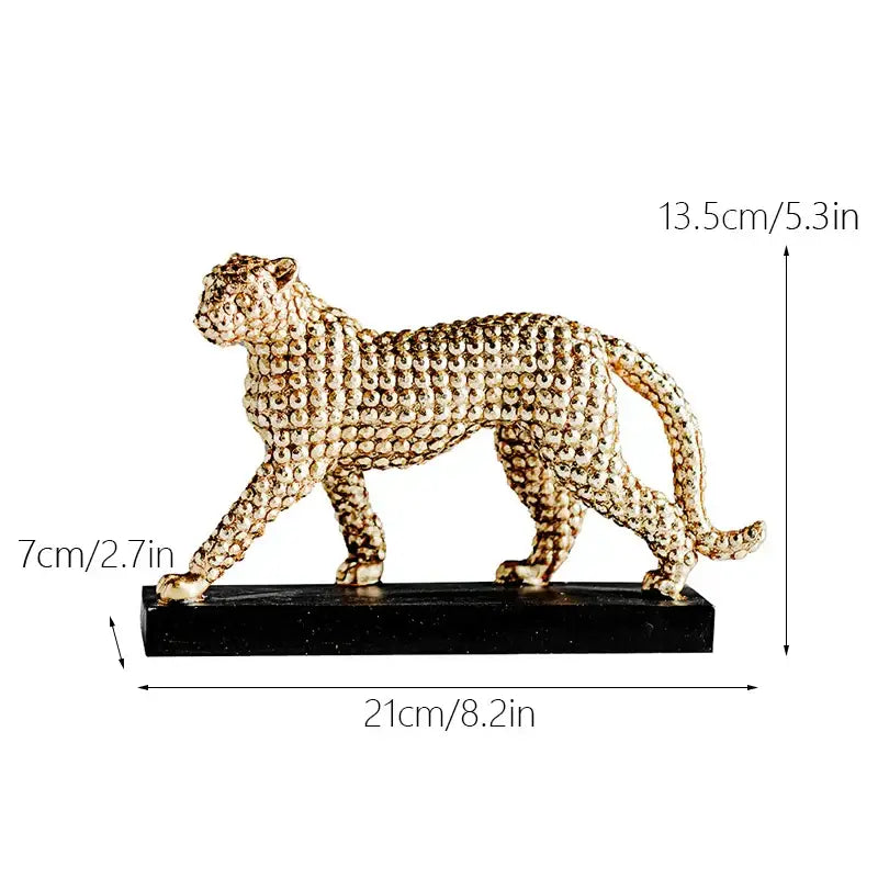 Modern golden leopard resin figurine with textured beaded surface on black base for living room decor by decorbites