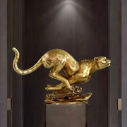 Modern golden leopard resin cheetah sculpture with detailed spotted pattern and dynamic pose for living room decorbites decor