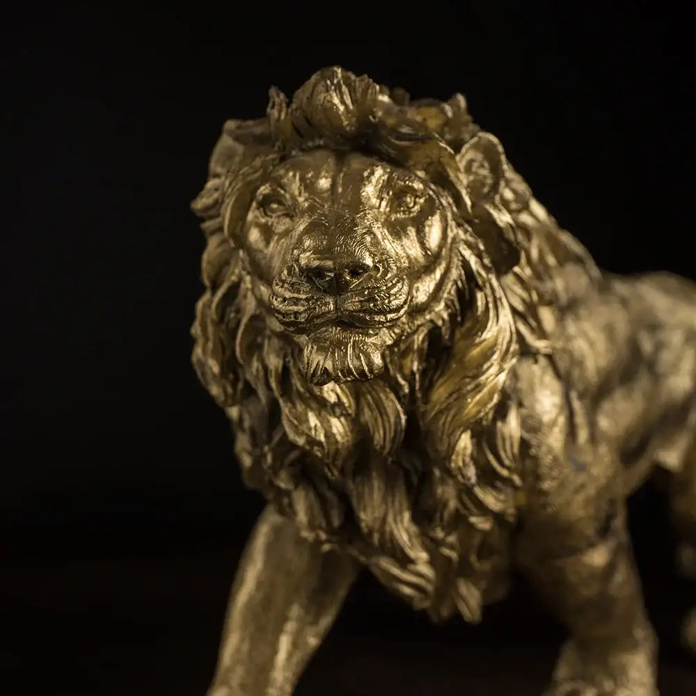 Modern golden lion king statue with detailed mane and textured surface perfect for office decor by decorbites golden lion