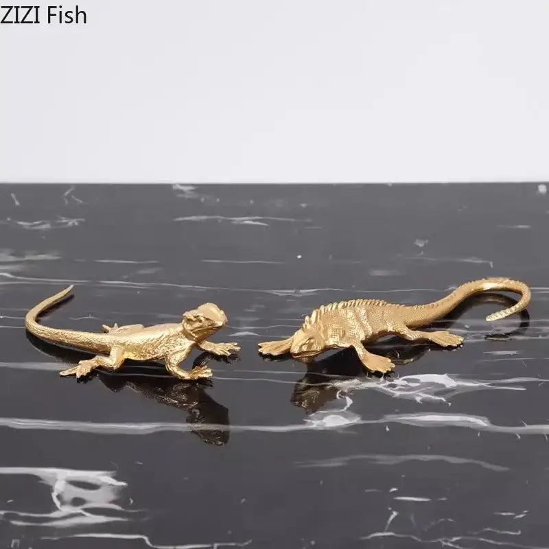 Gold-colored modern golden lizard sculpture with textured scales and articulated limbs metal desk ornament for living room