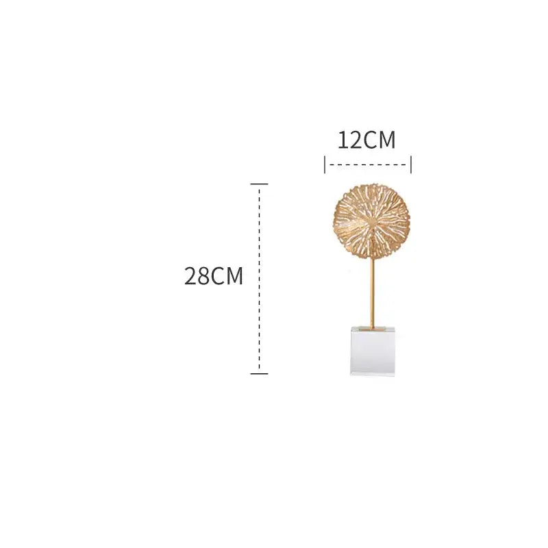 Gold-toned lotus sculpture with intricate texture on slender stem and clear acrylic base for modern living room decor