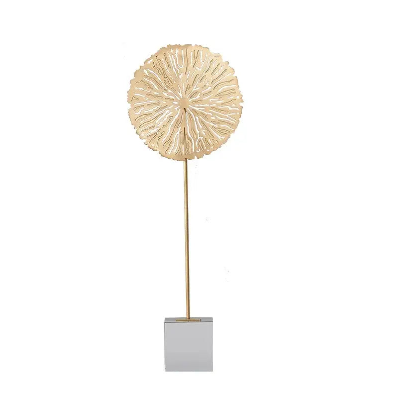 Modern golden lotus sculpture in gold-toned metal coral design on sleek silver base for living room decor