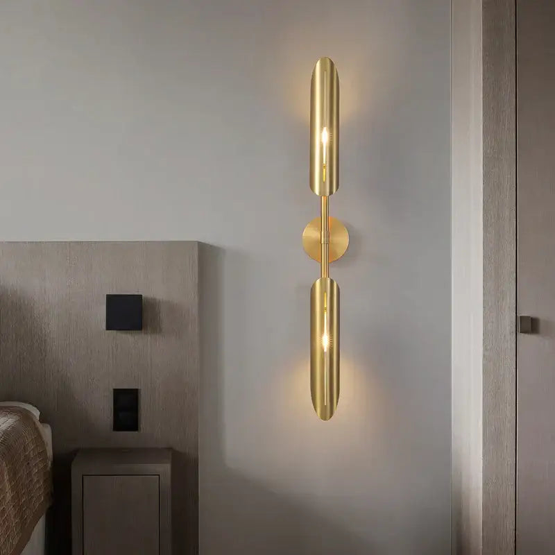 Modern golden metal led wall lamps wall sconce with two cylindrical shades and circular base for bedroom and living room decorbites golden metal