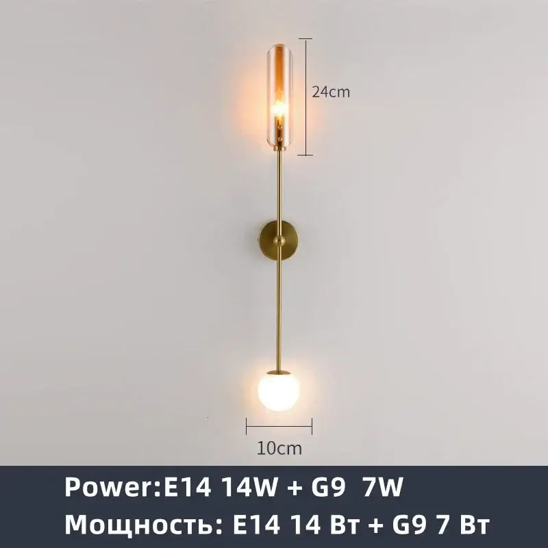 Modern golden metal led wall lamps featuring a brass cylindrical glass shade for bedroom and living room decorbites decor