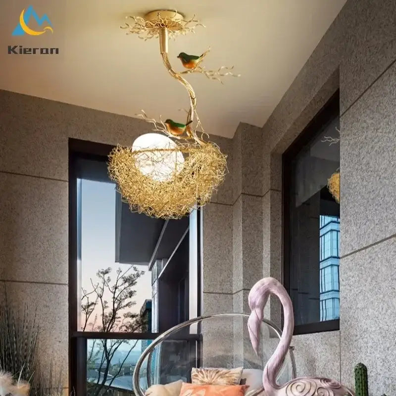 Modern golden nest glass led ceiling lamp featuring a bird-themed intricate branch and nest design for living room decor