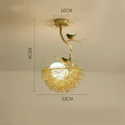 Modern golden nest glass led ceiling lamp with intricate branch design and two green and orange birds for living room decor