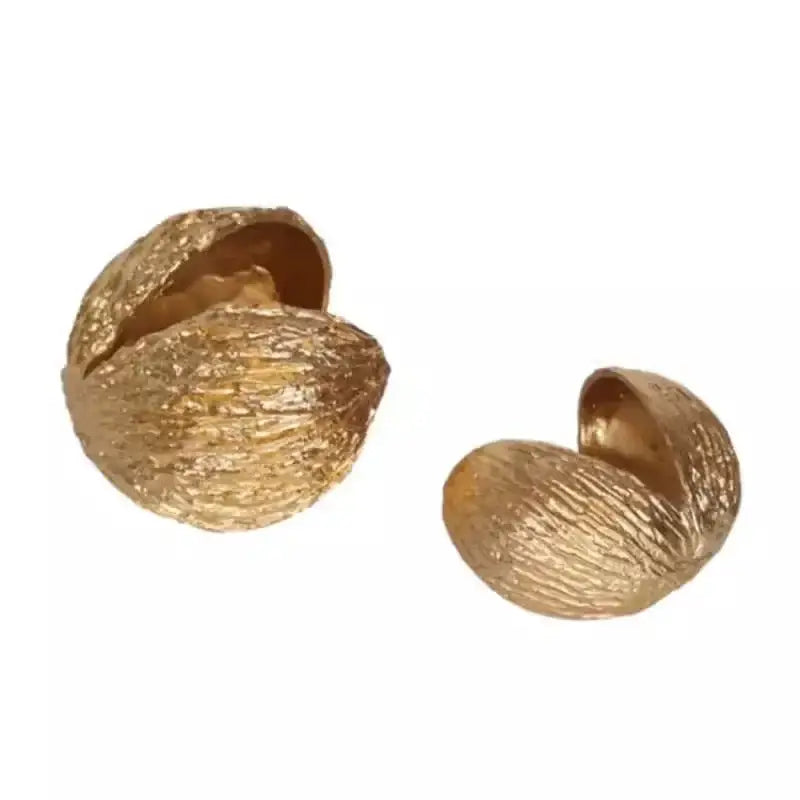 Modern golden nut shell ornaments desk decor featuring textured metallic finish golden nut shell design for living room