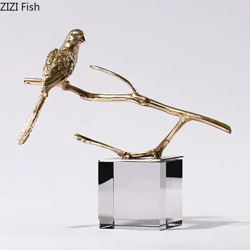 Modern golden parrot bird statue with gold finish perched on branch on crystal base decorbites copper bird decor