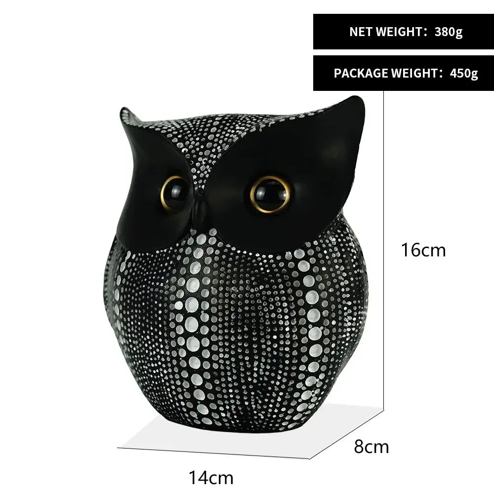 Black owl figurine with dotted pattern and gold-rimmed eyes decorbites golden owl animal statues for modern decor