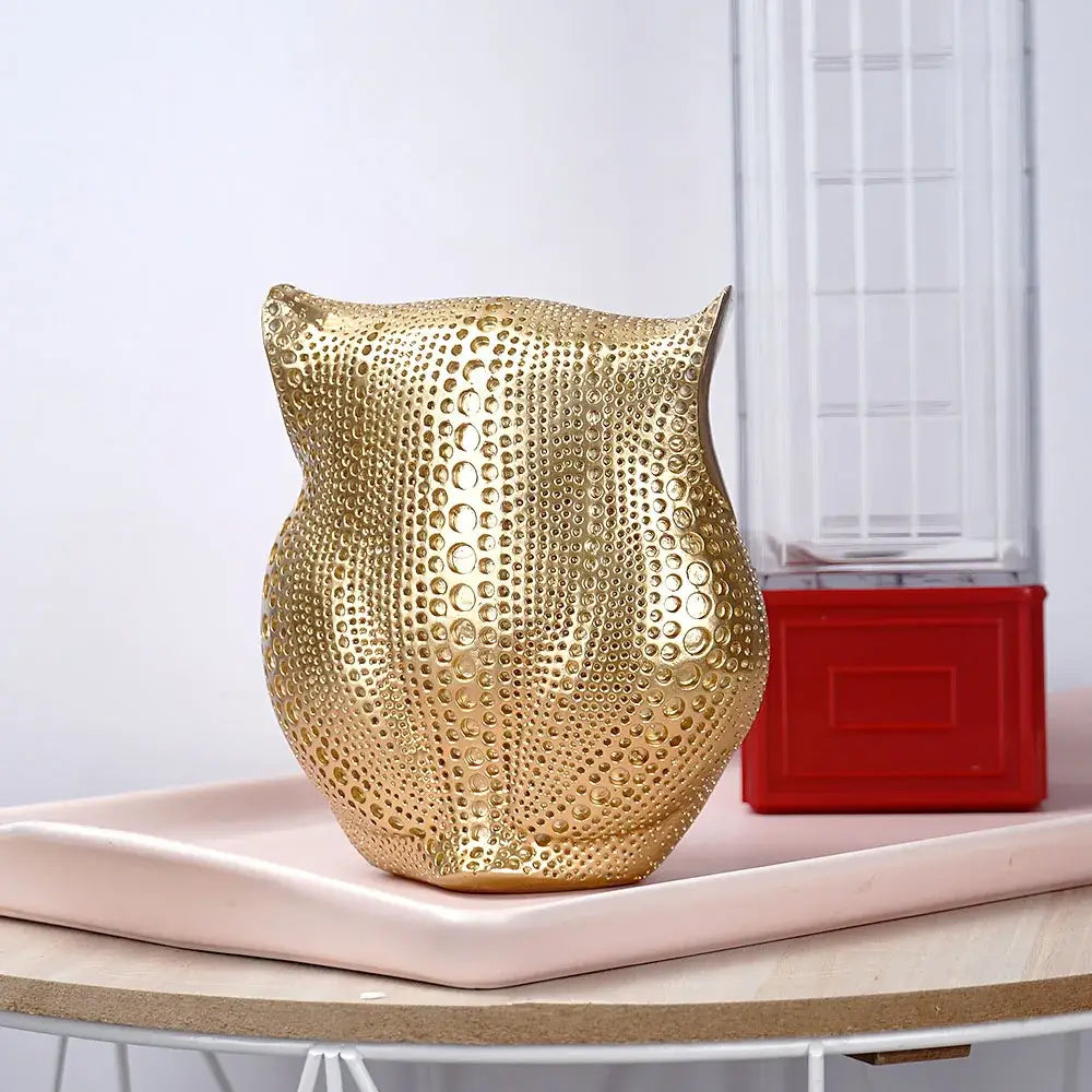 Modern golden perforated owl figurines with textured dotted surface animal statues for living room decorbites golden owl