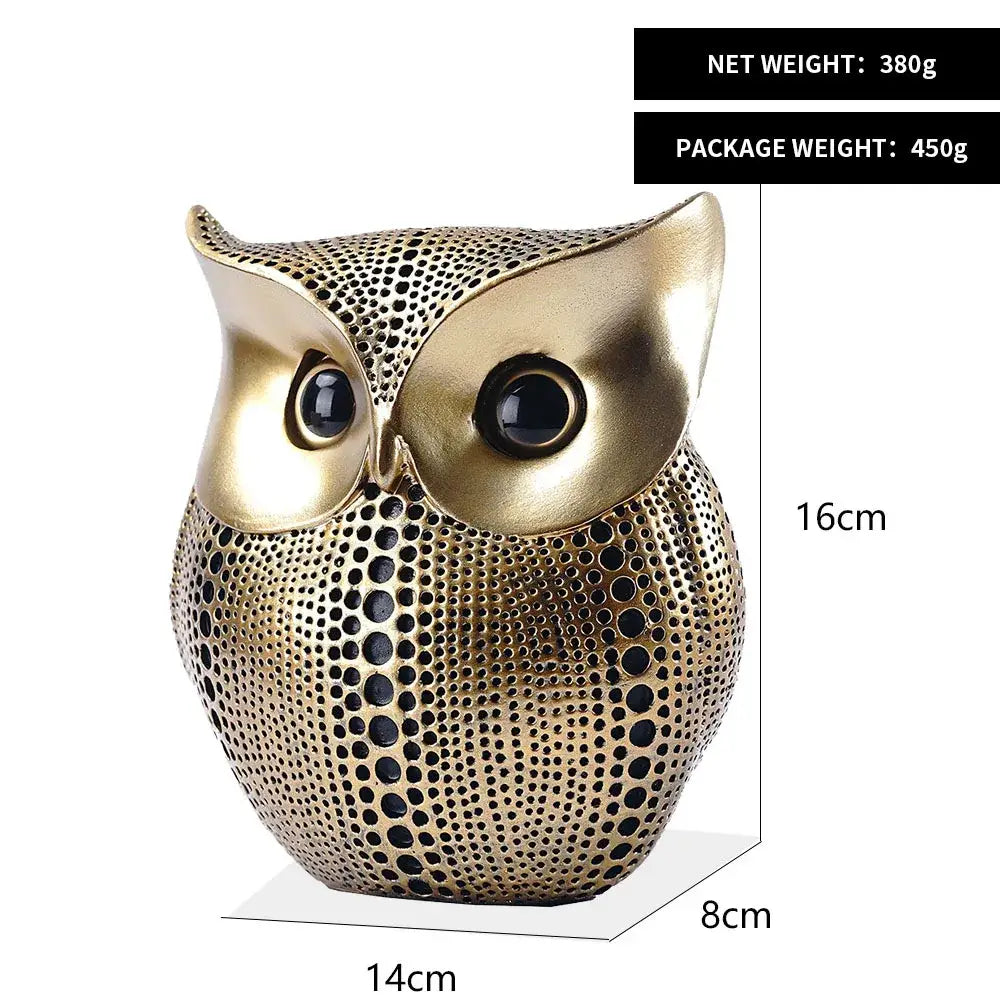 Modern golden perforated owl figurines with glossy black eyes serve as elegant animal statues for living room decorbites golden owl