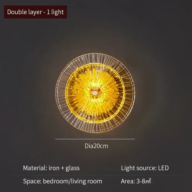 Modern golden radial decorbites crystal wall lamp with double-layered glass and iron emitting warm yellow light
