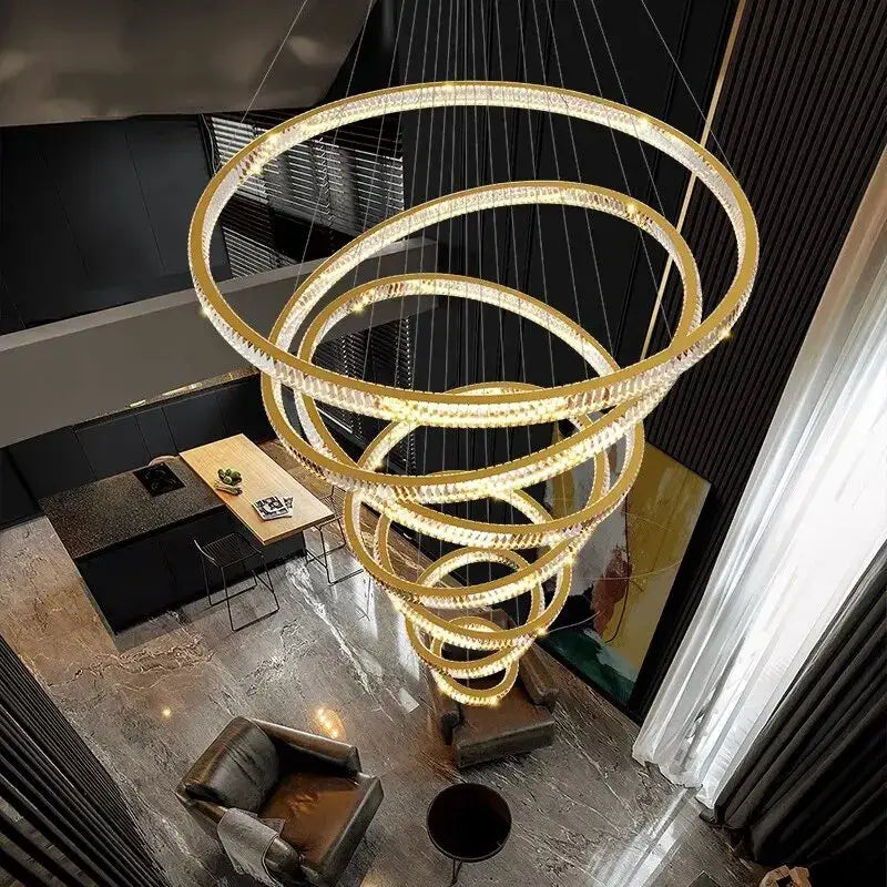 Modern golden spiral crystal round chandelier with crystal accents decorbites crystal round staircase pendant light