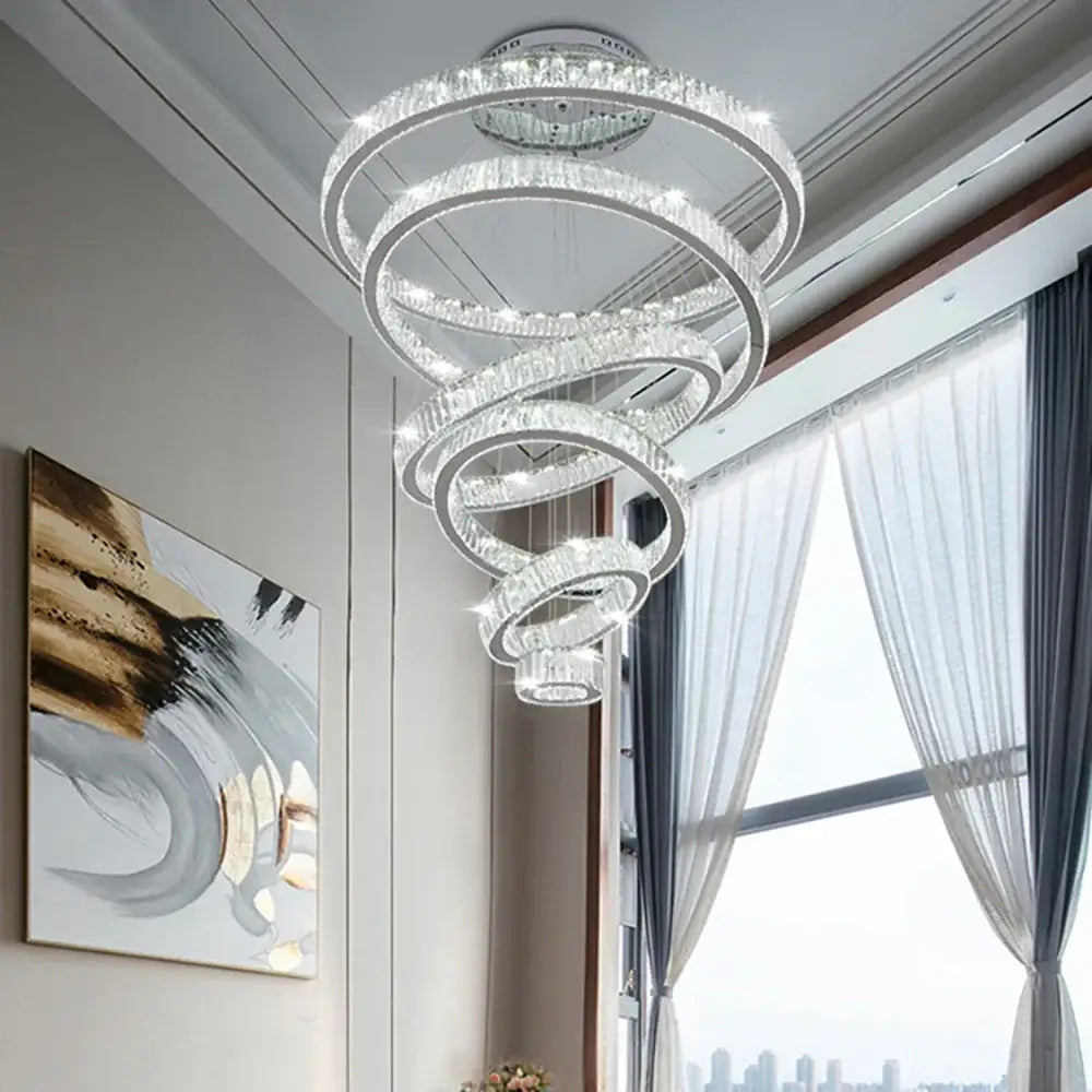 Modern golden spiral crystal round chandelier with clear crystal rings and polished chrome by decorbites crystal round