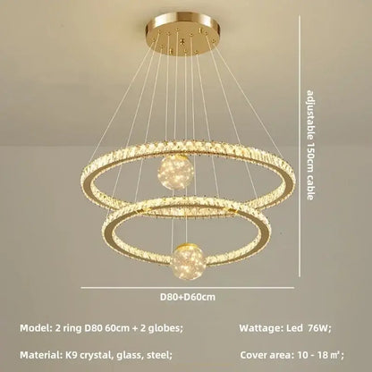 Modern golden spiral decorbites crystal led chandelier with two interlocking crystal rings and spherical LED lights