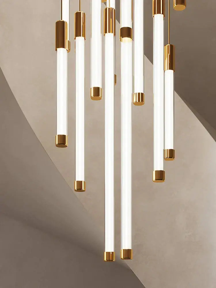 Modern golden tube chandelier featuring slender white cylindrical tubes capped in polished gold for staircase decorbites golden tube
