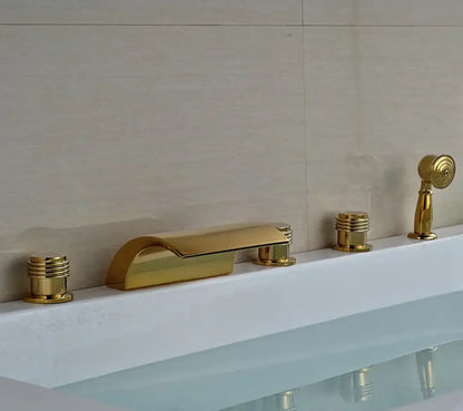 Modern golden widespread brass bathtub faucet set with sleek curved spout and two cylindrical handles for bathroom use