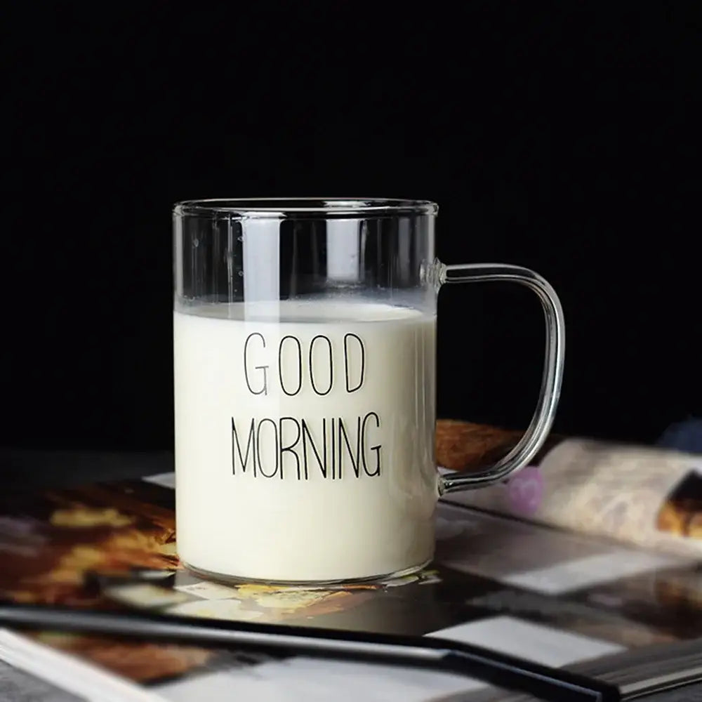 Clear glass mug with handle featuring good morning glass black lettering by decorbites for modern kitchen use