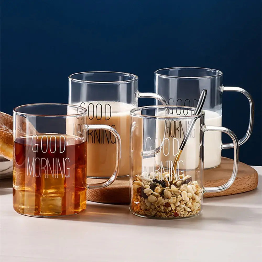 Clear glass good morning glass mugs by decorbites with transparent handles filled with beverages and granola