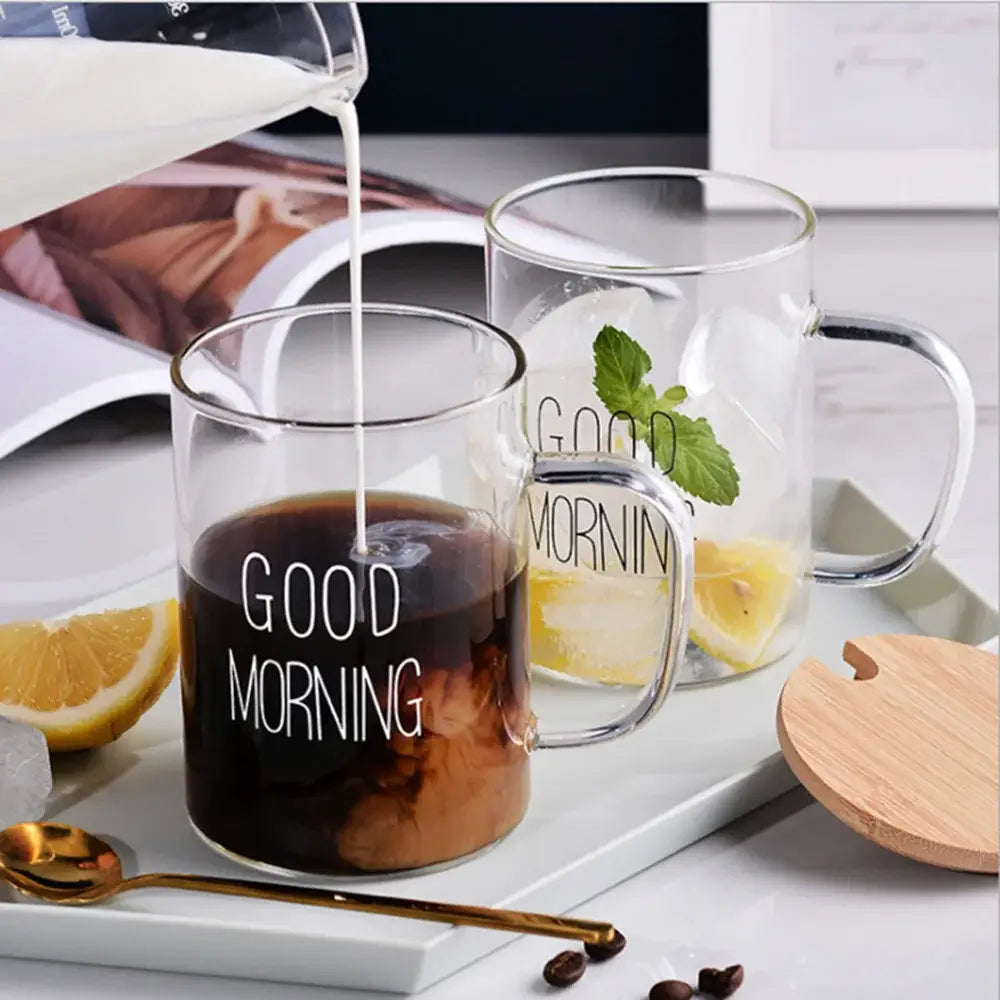 Clear glass good morning glass mug with handles filled with coffee and lemon water modern decorbites good morning tumbler