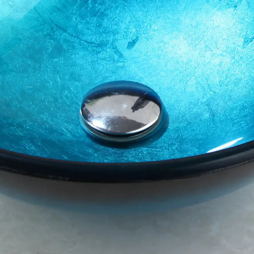 Modern gradient blue glass sink set featuring a shiny chrome drain in vibrant decorbites blue glass sink vessel sink