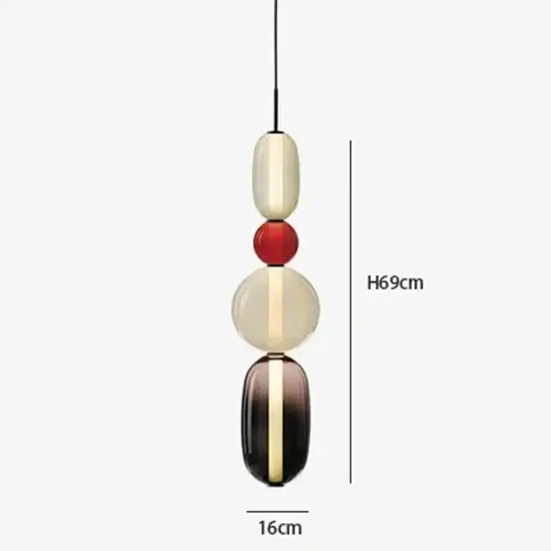 Modern glass pendant light with four stacked cream red and dark brown oval beads with gold accents for dining room