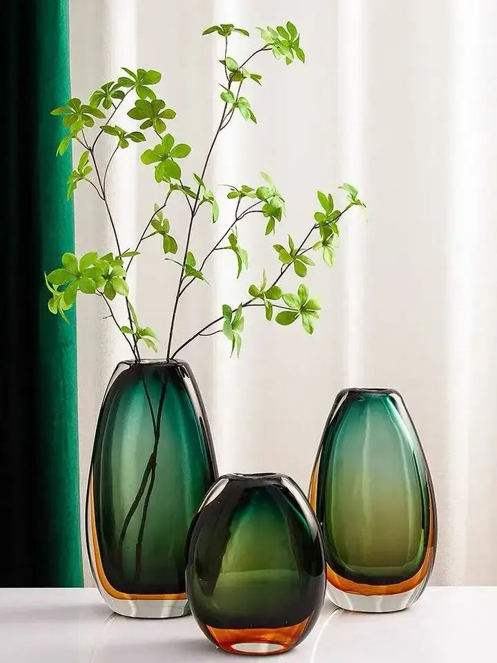 Three elegant gradient glass vases in green and amber hues for modern living room decor by decorbites gradient glass