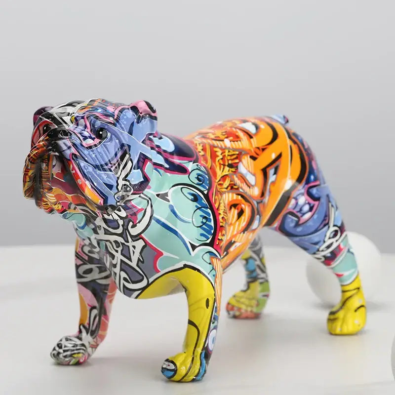 Vibrant graffiti-style blue orange yellow and black decorbites bulldog figurines as modern living room art ornament