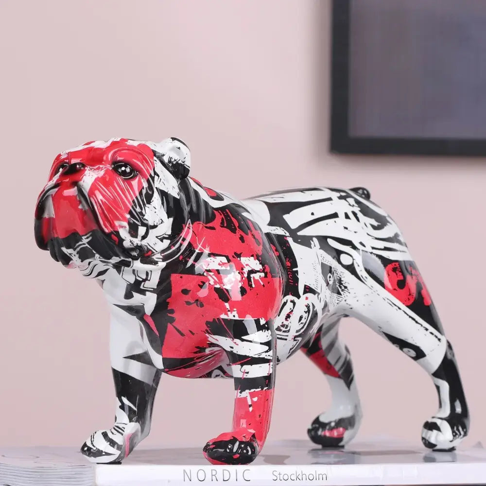 A vibrant red black and white spray-painted decorbites bulldog figurine with glossy finish for living room art decor