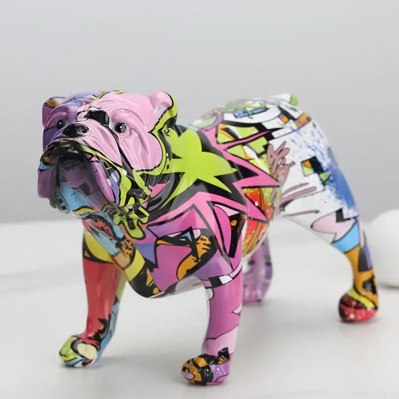A vibrant decorbites bulldog figurine with glossy finish in pink purple green yellow and blue for living room decor