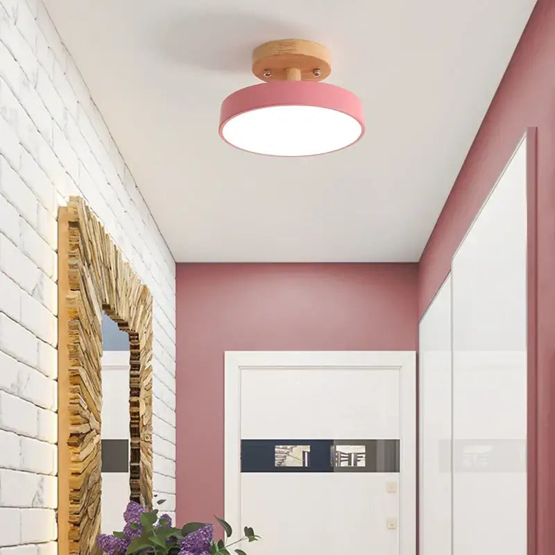 Pink circular ceiling light with wooden base featuring decorbites acrylic wood led for modern bedroom decor