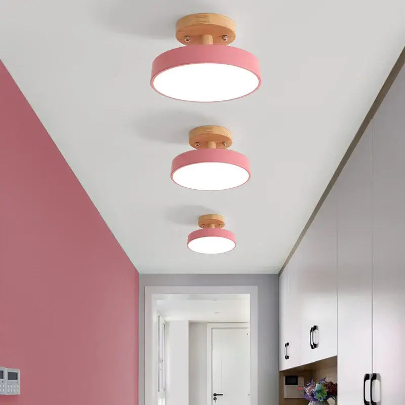 Modern gray acrylic wood led ceiling light with pink circular shade and wooden base by decorbites for bedroom decor