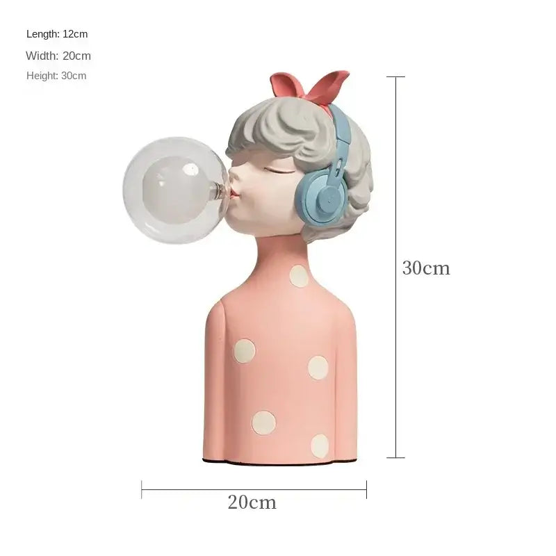 Modern gray and gold bubble girl statue night light featuring a pink polka-dot resin decorbites bubble girl with headphones