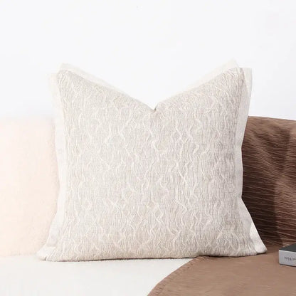Beige textured cushion cover with subtle woven pattern and soft finish for modern gray and white leaf decorbites black white sofa