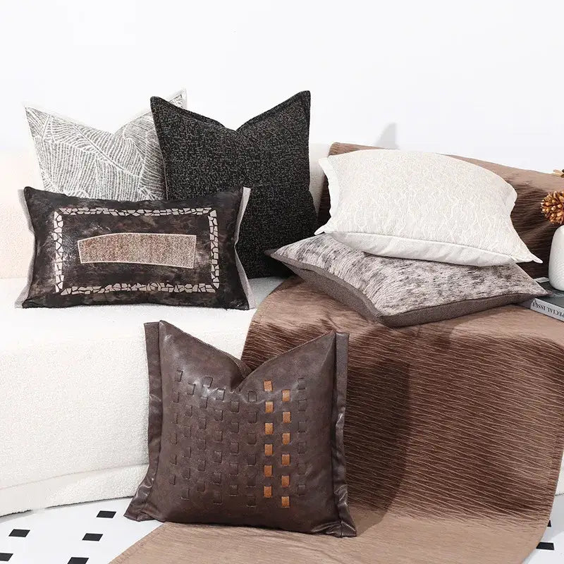 Brown leather cushion cover with woven texture and tan accents for modern gray white leaf decorbites black white sofa