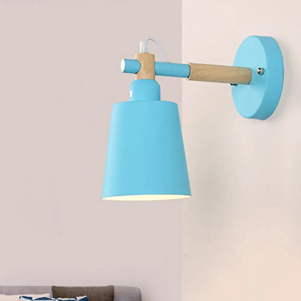 Modern gray and wood wall sconce light with blue matte finish lamp and wooden arm for bedroom use