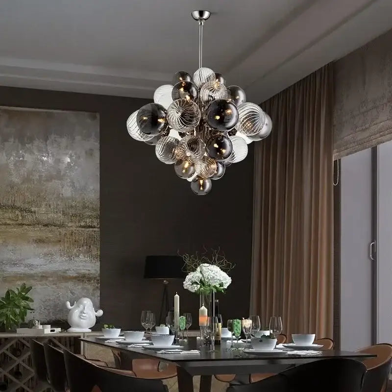 Modern gray and clear bubble glass ceiling chandelier with clear, frosted, and dark mirrored spheres by decorbites bubble glass