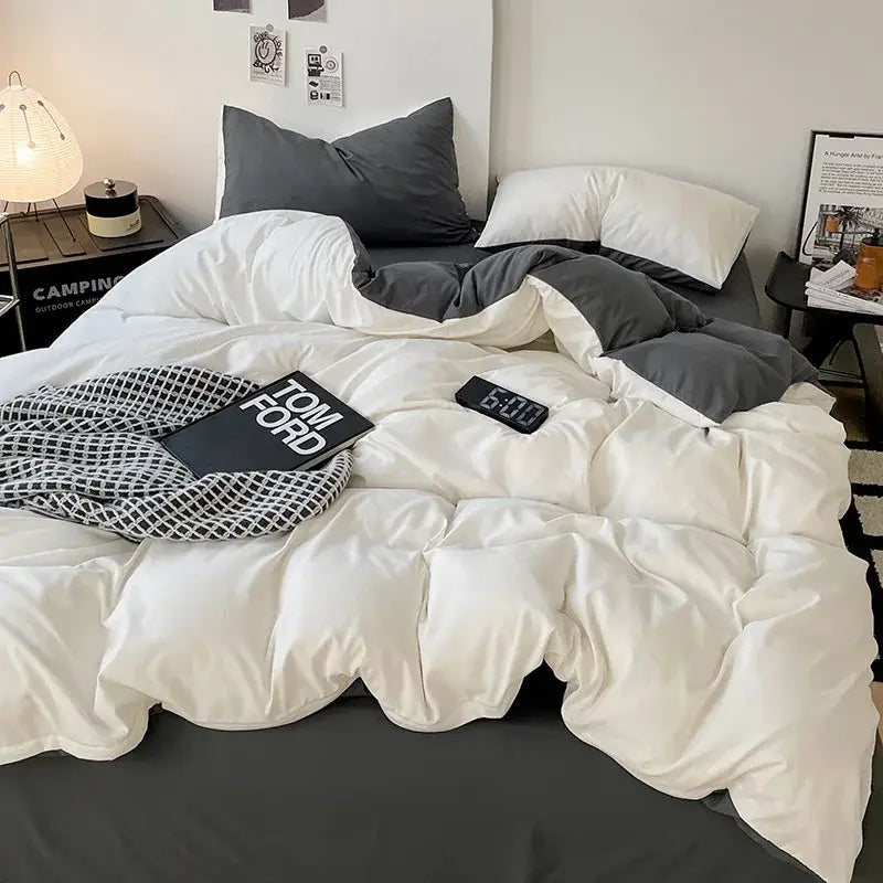 White plush quilted duvet comforter cover set with a soft textured surface and subtle sheen for modern bedroom bedding