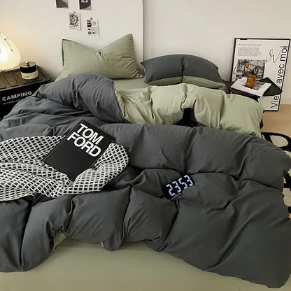 Modern gray comforter cover set with plush quilted fabric and olive green accent pillow for bedroom bedding