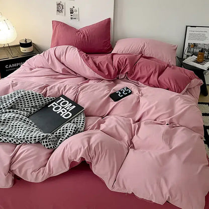Modern gray comforter cover set with geometric throw features a pink quilted duvet cover set with matching pillows and bedspread