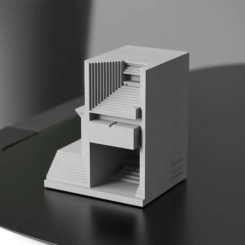 White concrete architectural cemetery model of brian family with multi-level design for living room decor