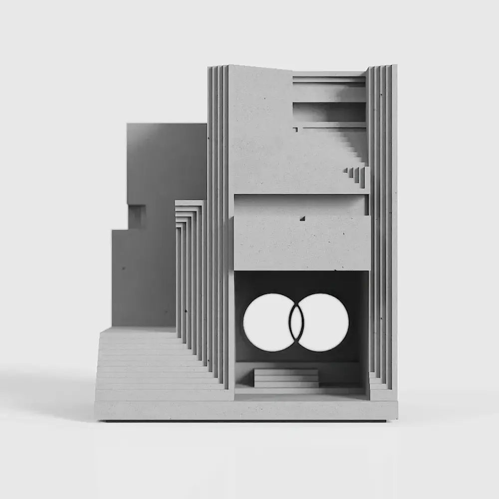Modern gray concrete brian family cemetery model with layered geometric forms and recessed interior for living room decor