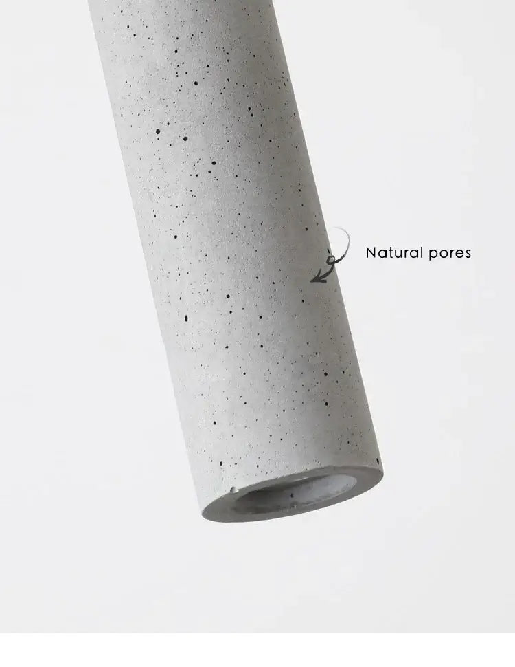 Modern gray concrete tube pendant light with natural pores ideal for dining room decorbites concrete tube pendant chandelier