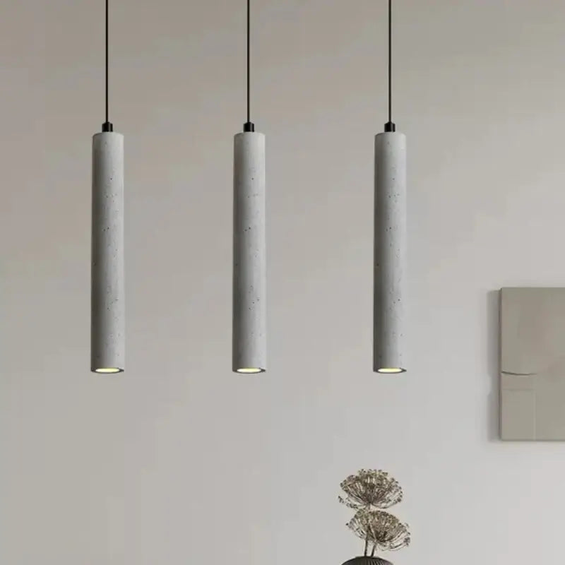 Modern gray concrete tube pendant light dining room triple chandelier with three minimalist concrete tube pendant lights and warm led bulbs
