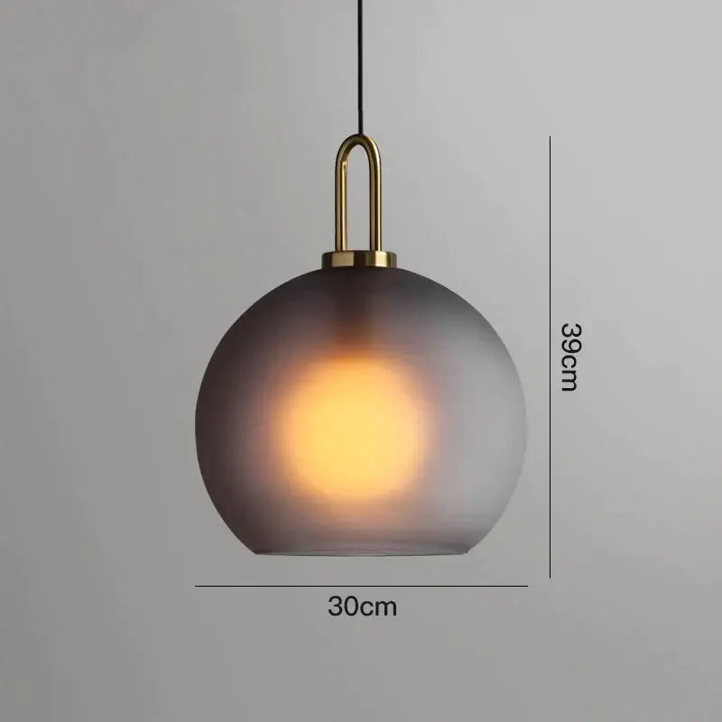 Modern gray glass ball pendant light with frosted globe and brass hardware measuring 39cm by 30cm decorbites glass ball pendant